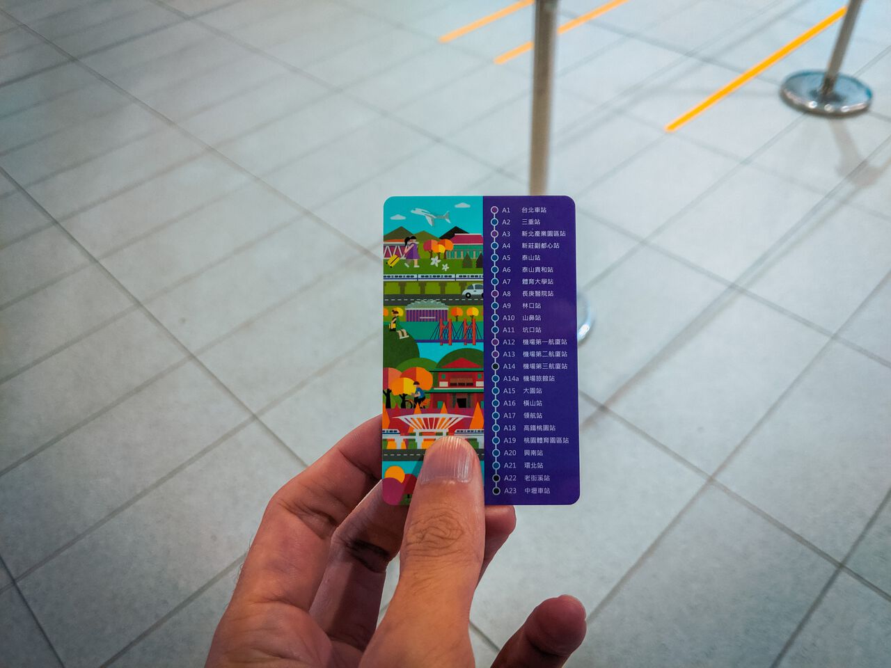 Me holding an EasyCard in Taipei, Taiwan.