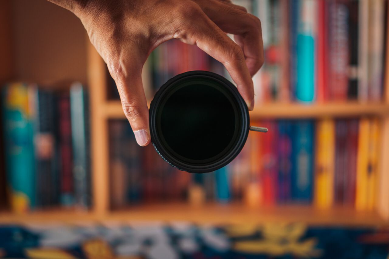 A man holding a variable ND Filter