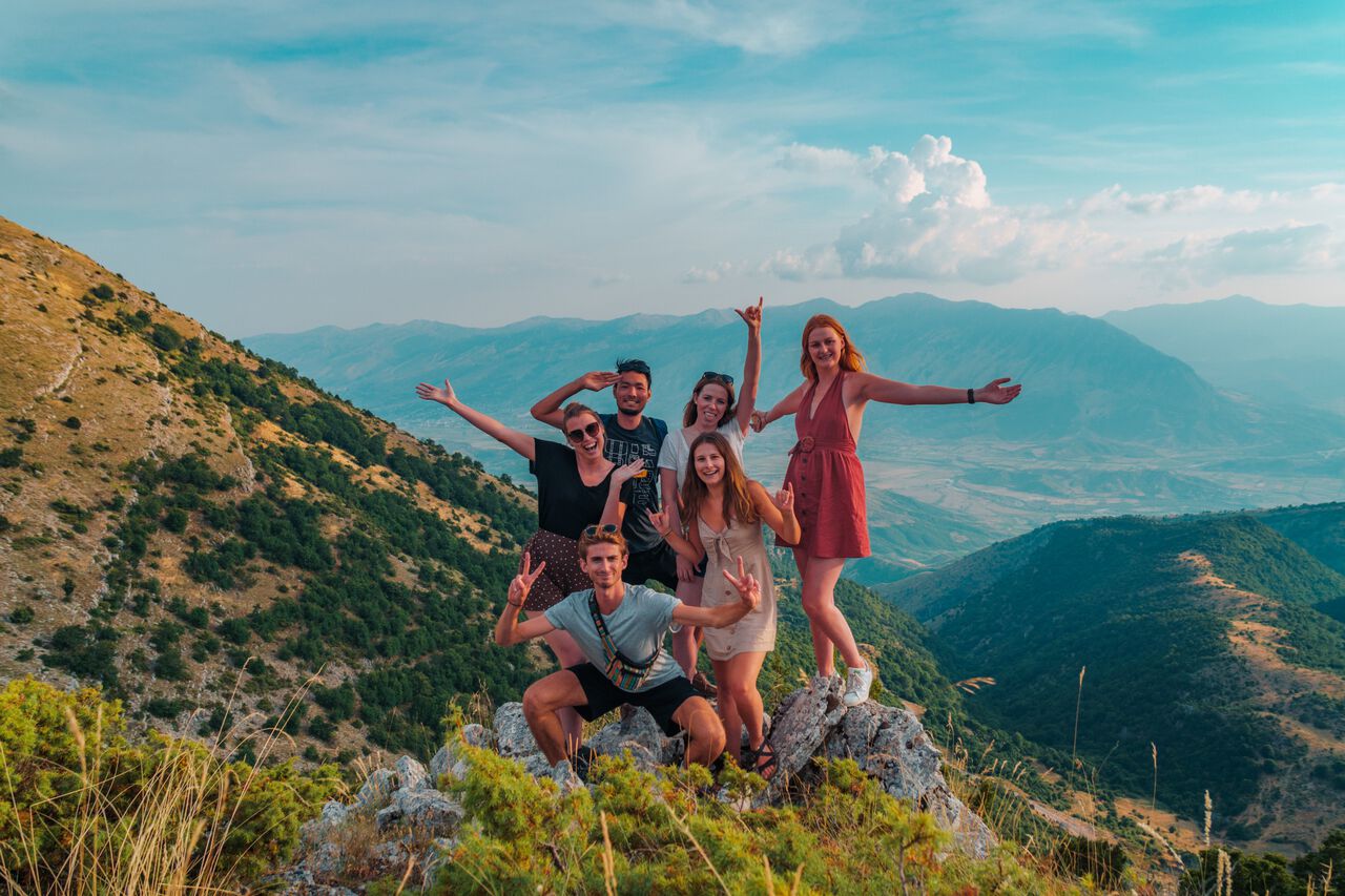 A group of backpackers traveling together in Albania