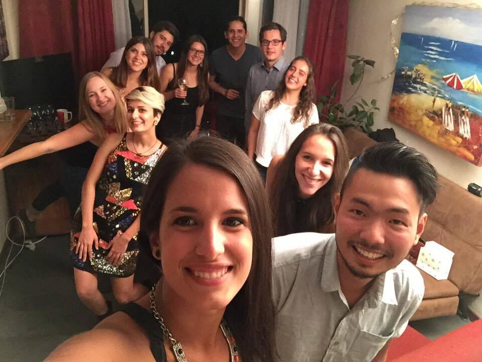 A group of person celebrating in a couchsurfing house in Santiago, Chile