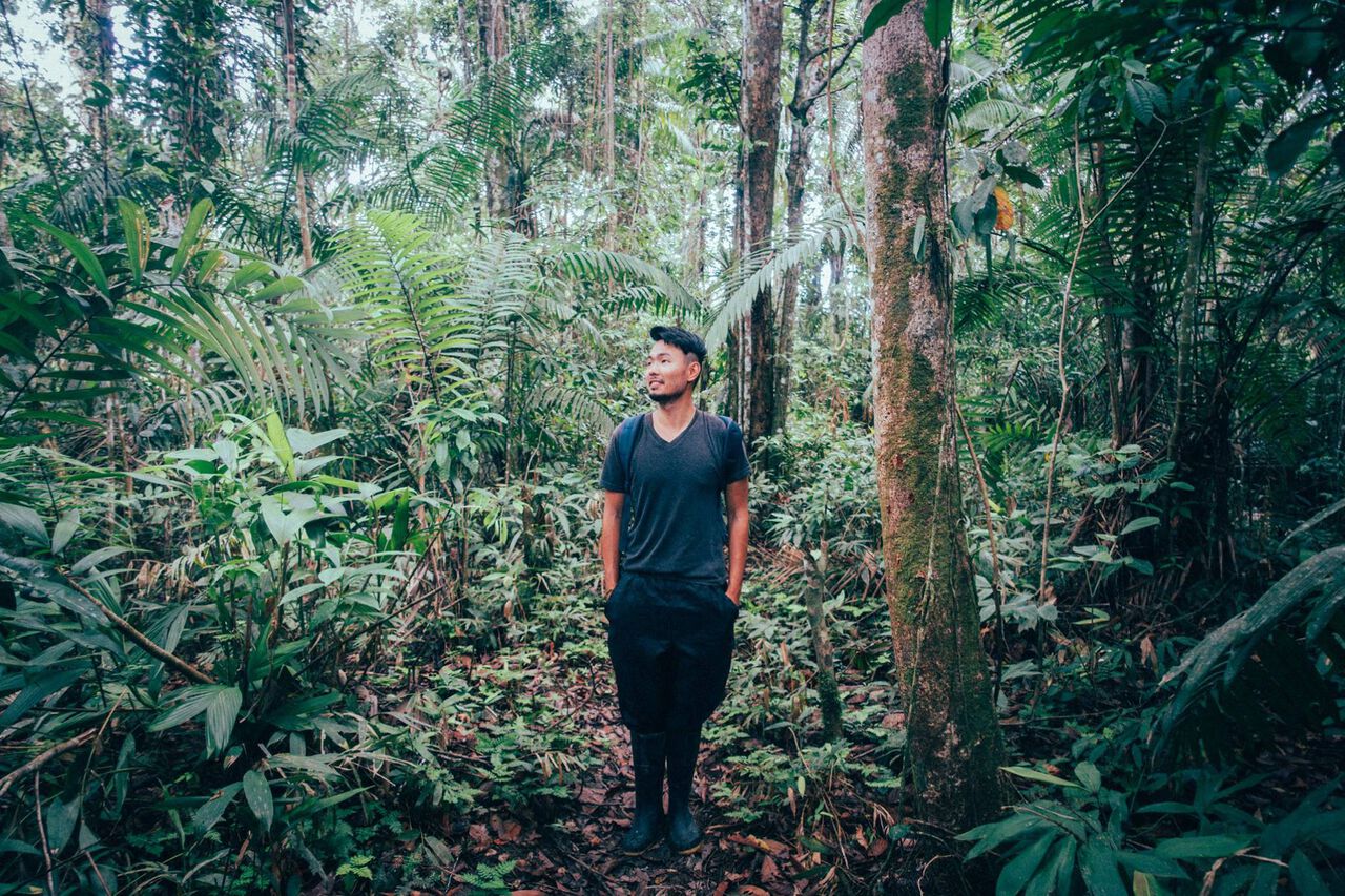 A person wearing a rain pant in the Amazon Forest in Ecuador, South America