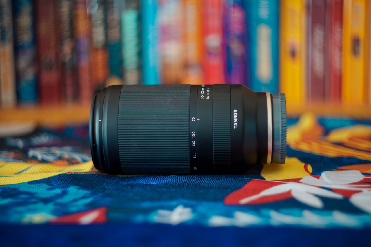 The Tamron 70-300mm lens of a table