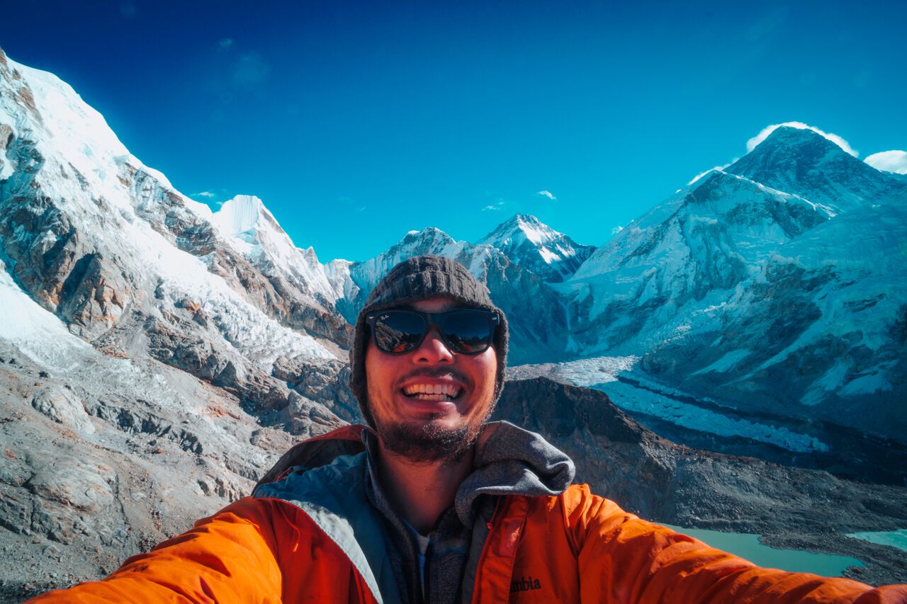 A person wearing a wool beanin at Everest Base Camp, Nepal