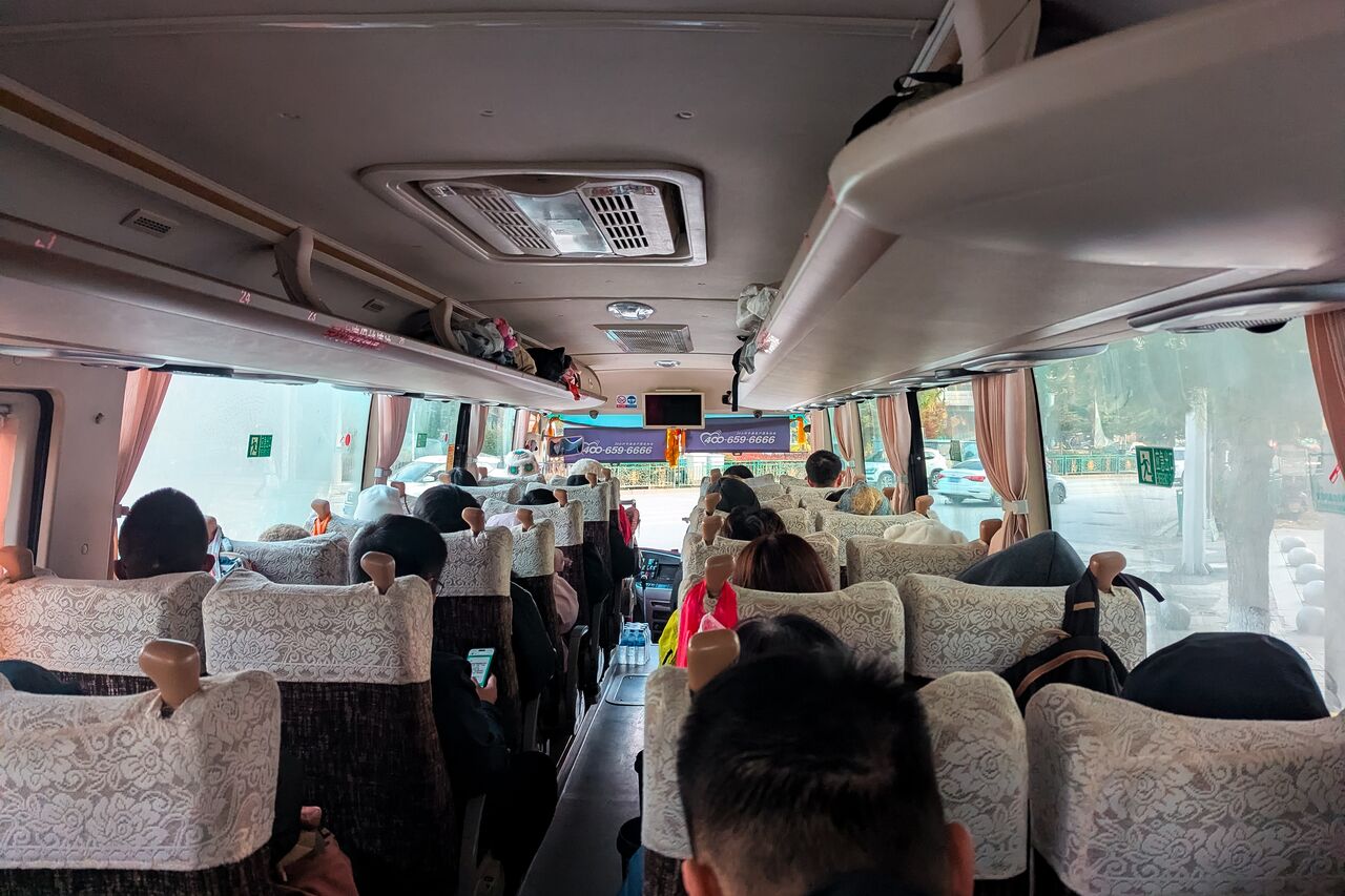 inside the bus to Yading