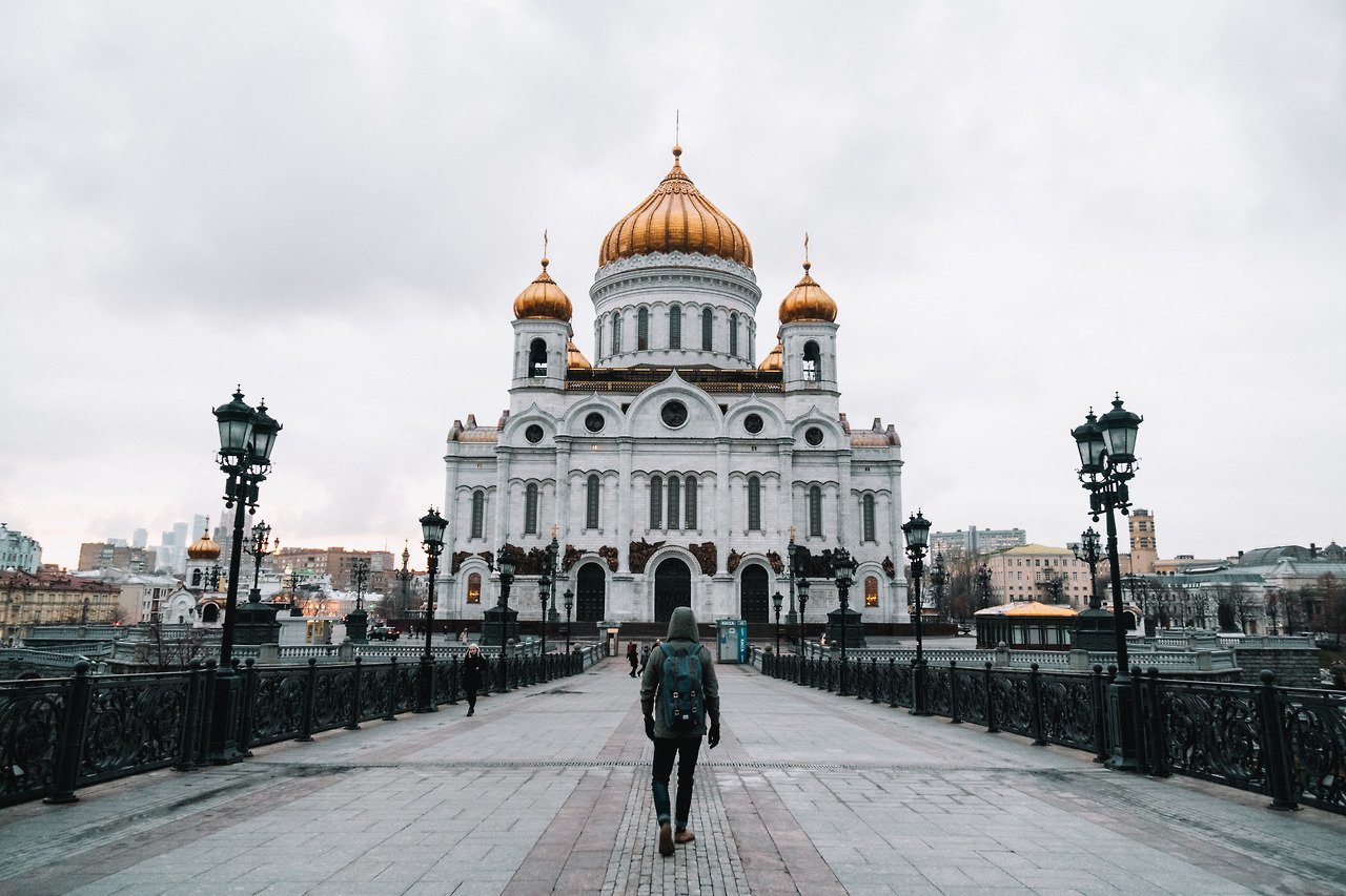 A person walking towards the Cathedral of Christ the Saviour in moscow, winter Russia in Europe