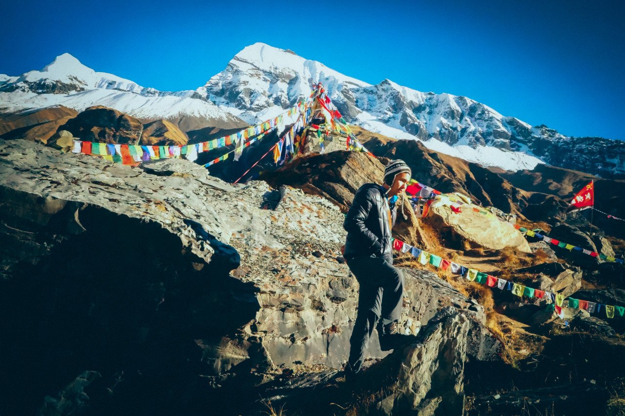 A person standing at Annapurna Base Camp in Nepal