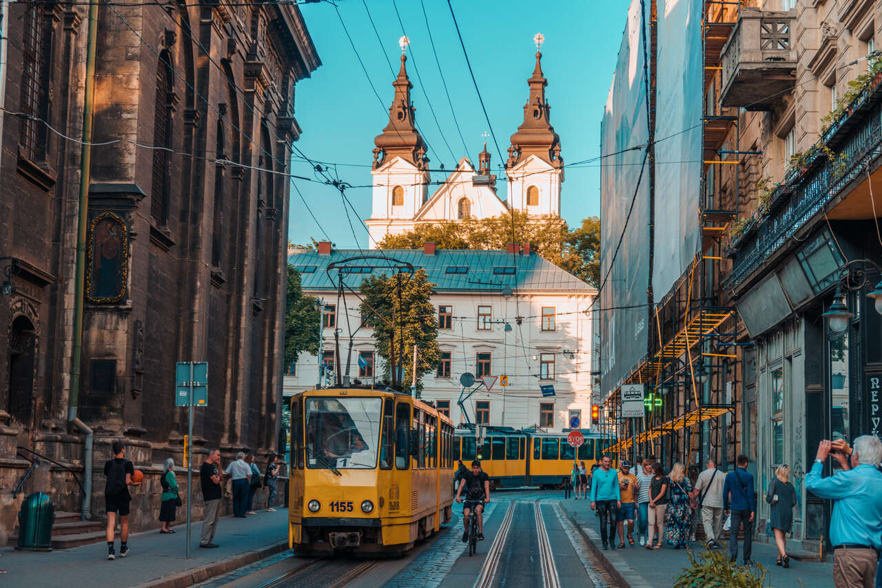 A yellow tram running in Lviv, Ukraine