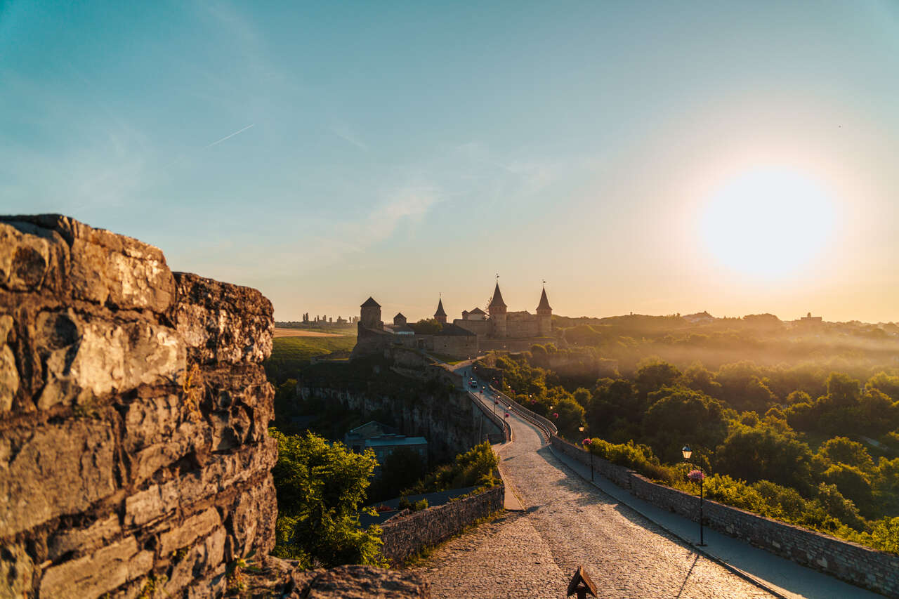Sunset behind Kamianets-Podilskyi Castle in Ukraine.