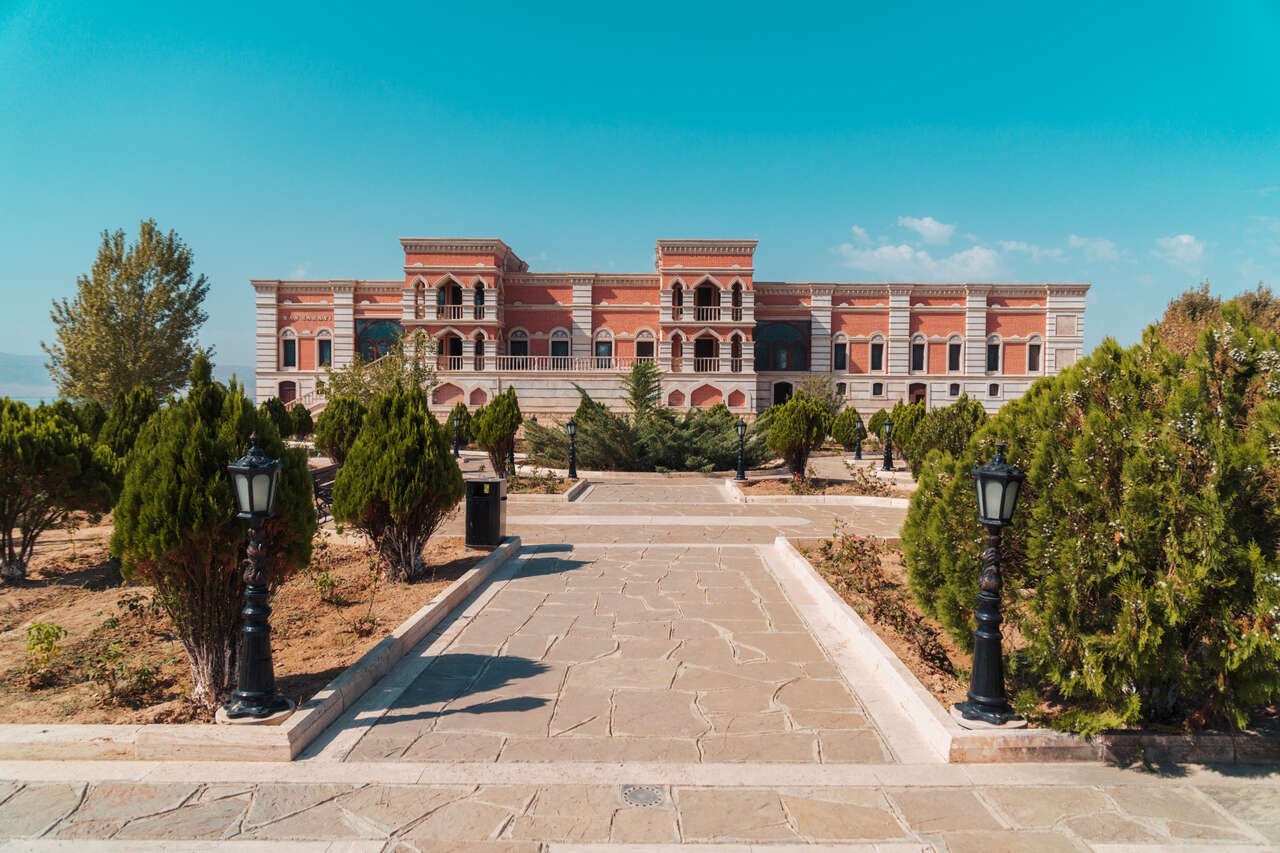 The Palace of Nakhchivan Khans and its front garden in Nakhchivan, Azerbaijan.