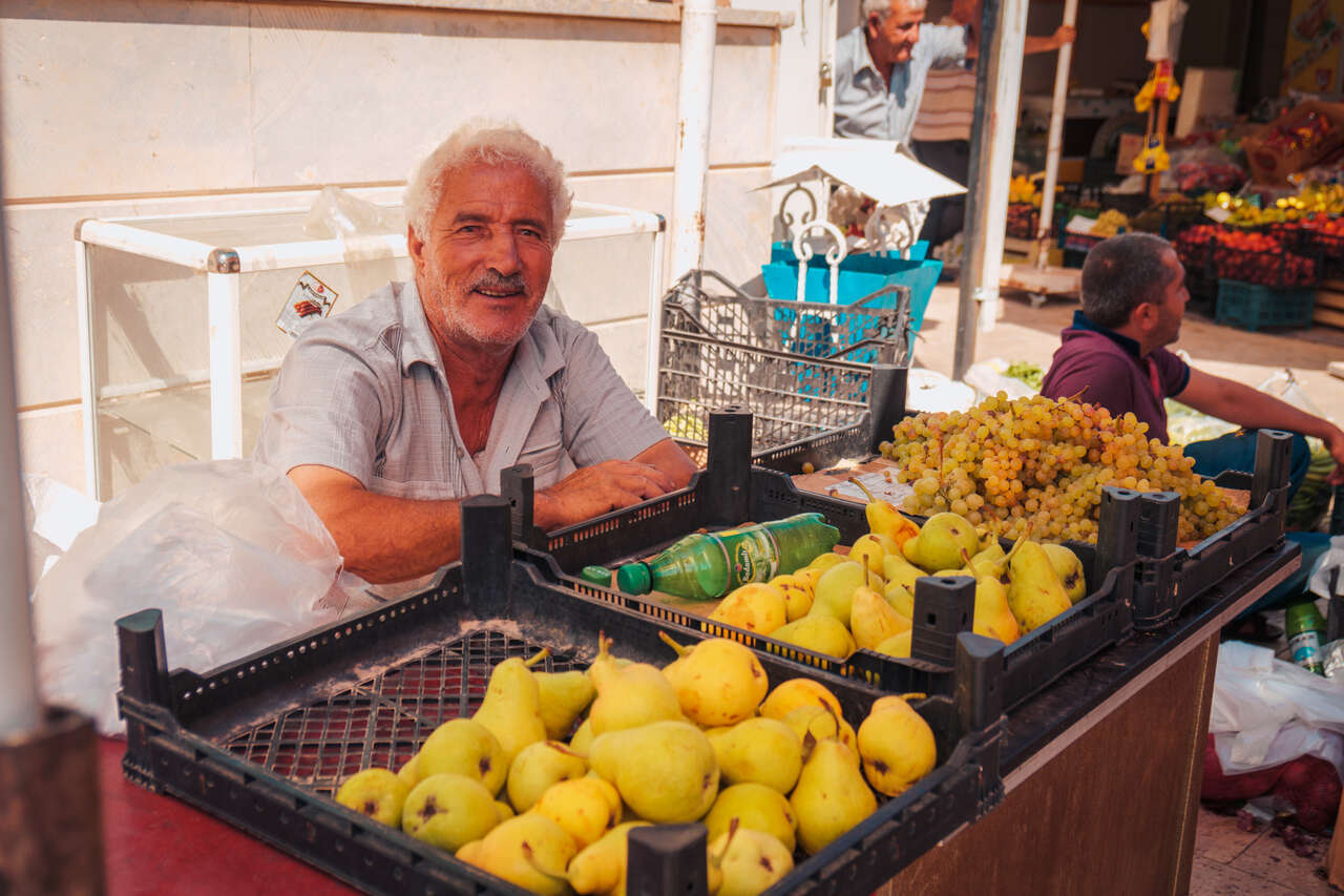 A guy at a bazaar smiling in Nakhchivan, Azerbaijan.