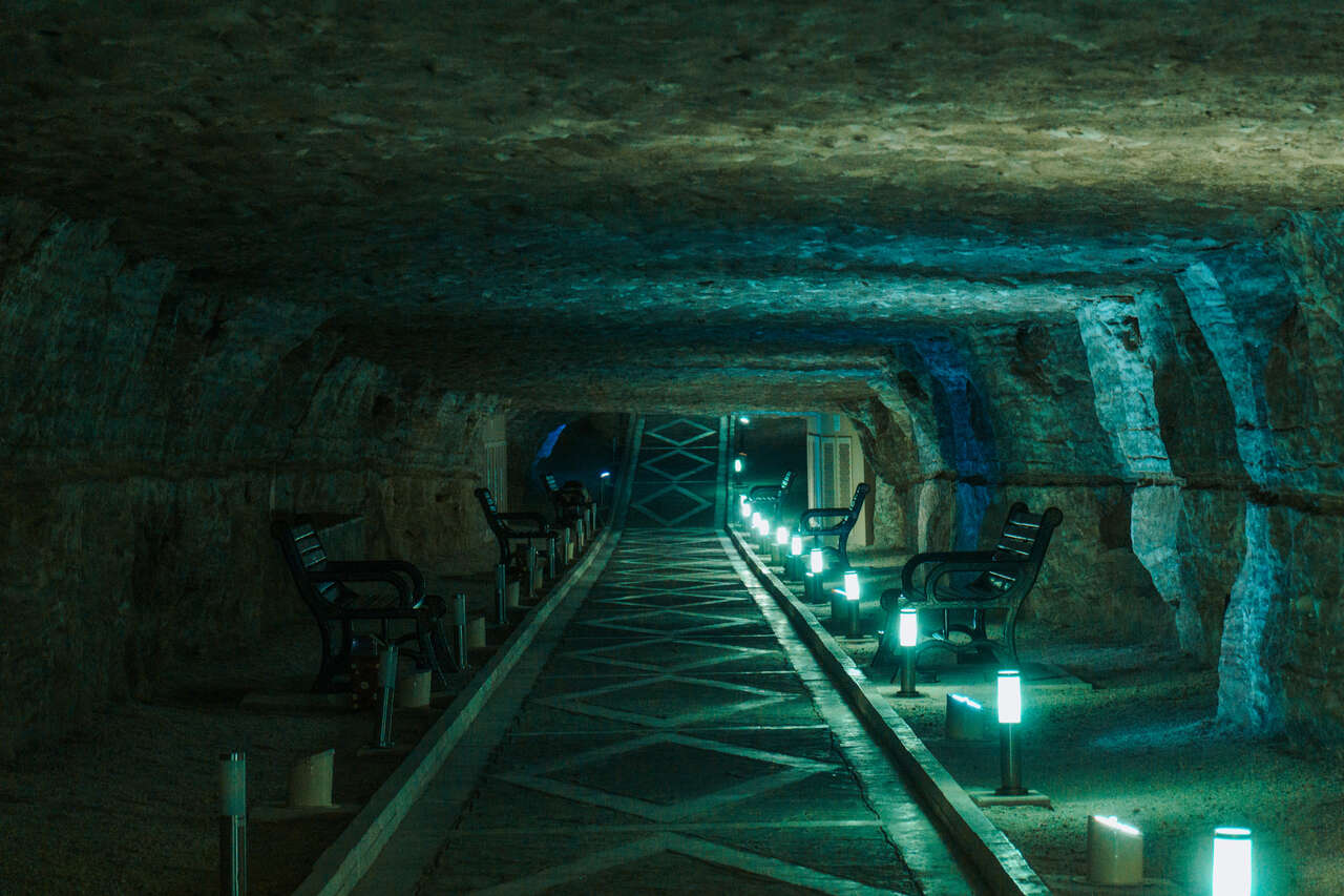 Several seats along the lit up walking path inside Duzdag Salt Therapy Center in Nakhchivan, Azerbaijan.
