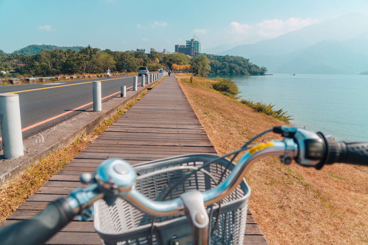 Me riding a bike along Shuishe Dam at Sun Moon Lake in Taiwan.