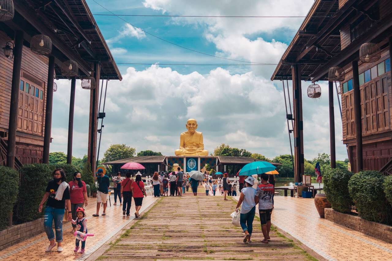 A pathway to a Monk Statue at Maharat Buddhist Park in Ayutthaya