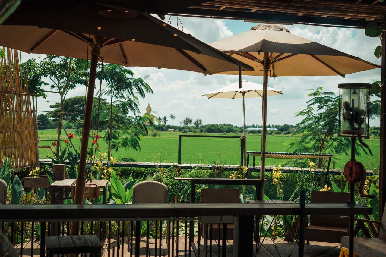 The outdoor seating area of the Lao Cafe in Ang Thong.