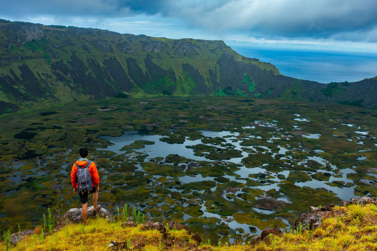 A person looking at Rano Kau