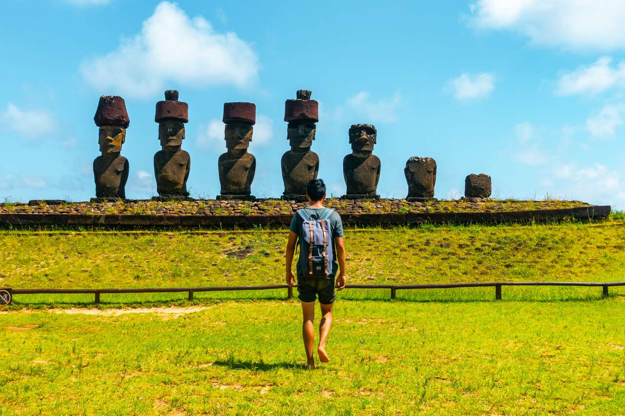 A person walking towards Ahu Nau Nau in Easter Island