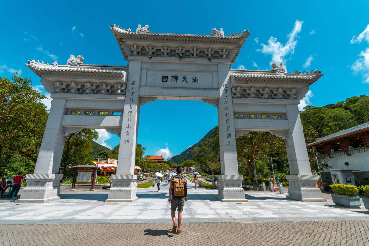 Me standing at a gate in Tian Tan Buddha