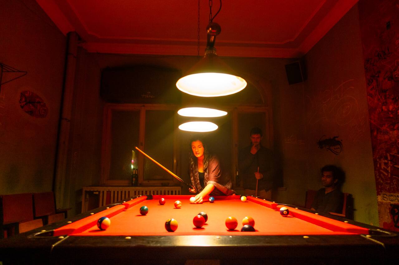People playing pool in a bar in Dresden