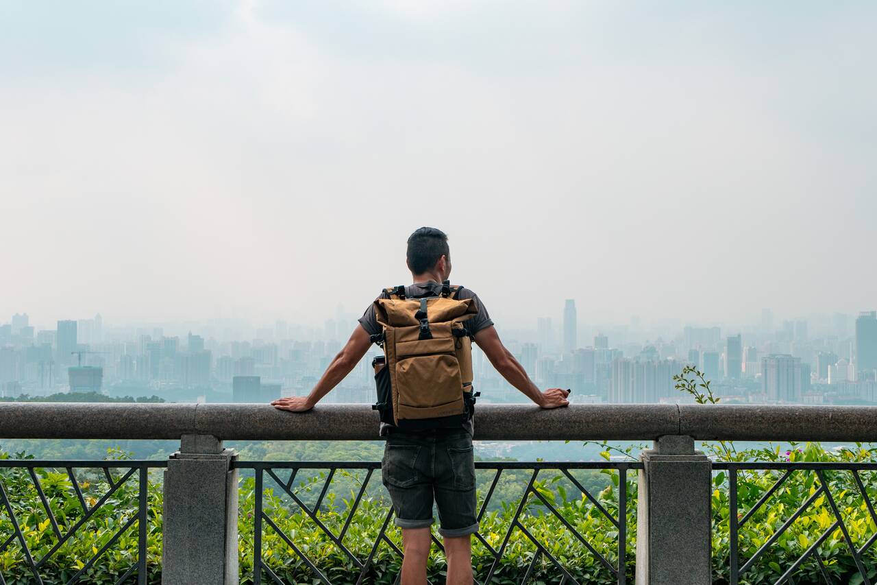 Me looking at the view from Baiyun Mountain Scenic Area