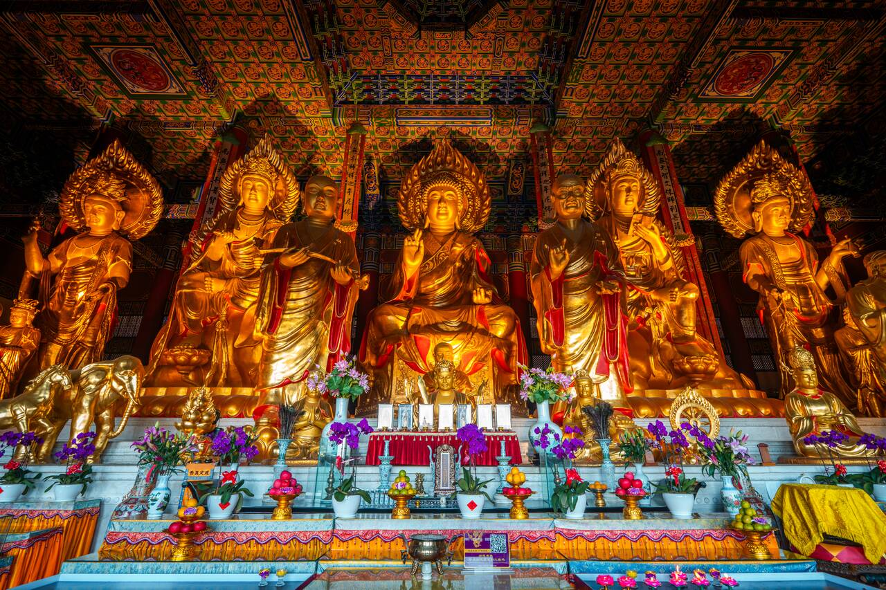 Buddha statues inside the final temple at Chongsheng Temple Complex