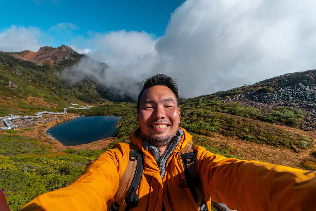 Me smiling at the top of Cangshan Mountain