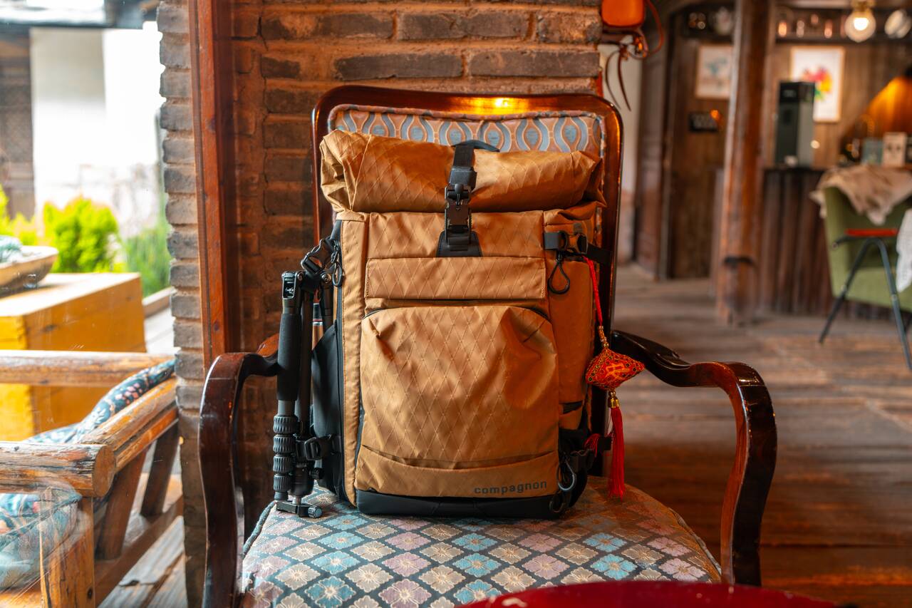 Compagnon Element Backpack on a chair in China