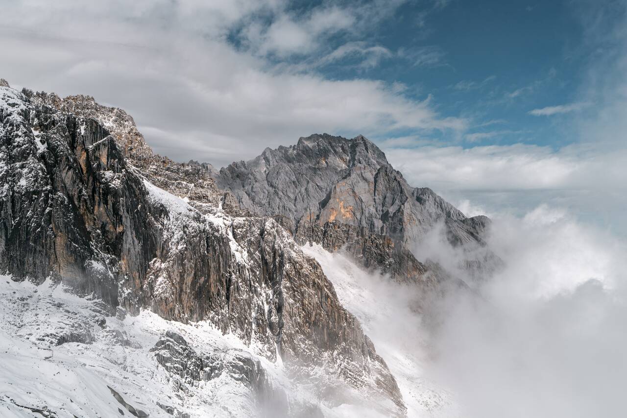 Mountains seen from Yulong Snow Mountain