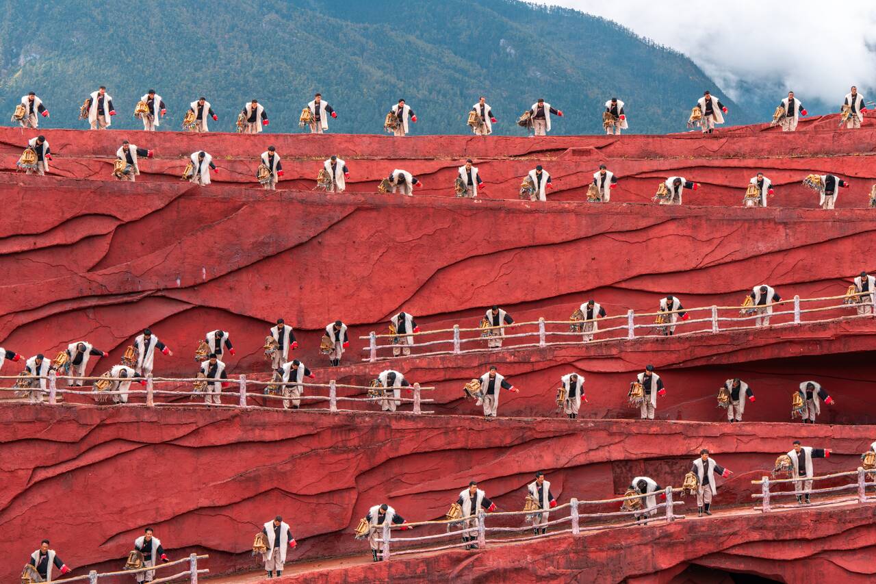 Men performers at Impression Lijiang Performance
