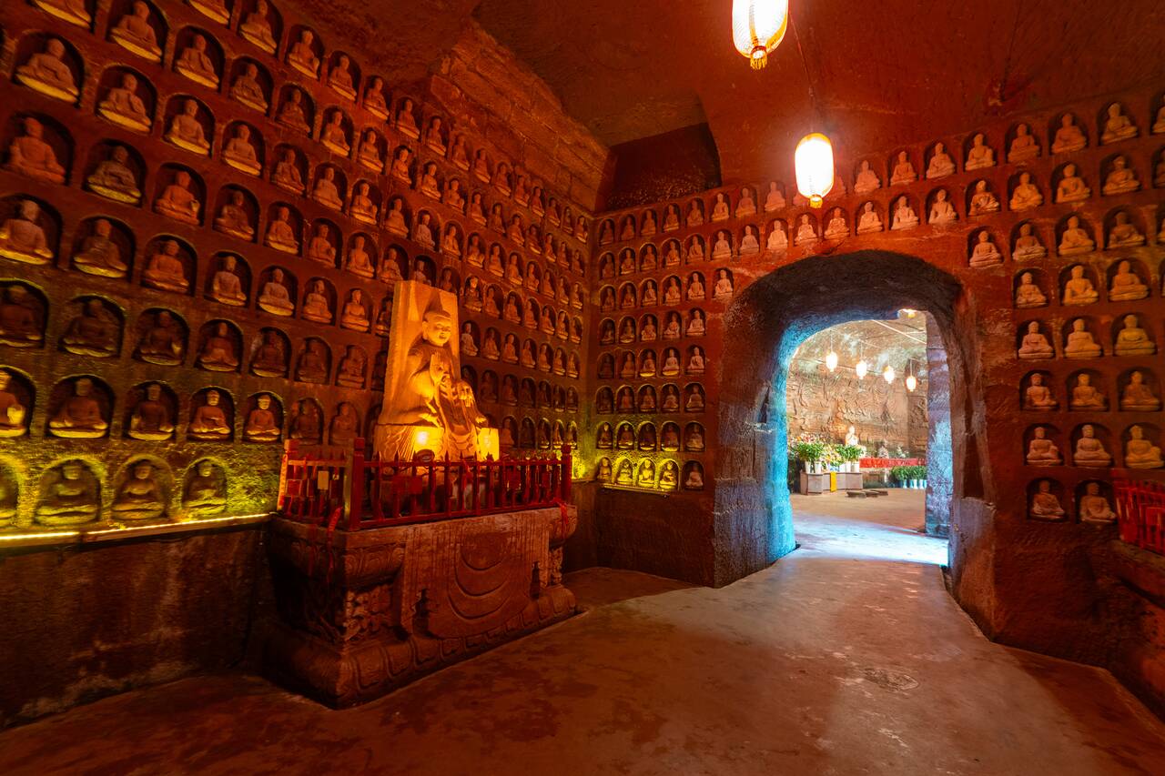 Budhda images inside a cave at Oriental Buddha Park