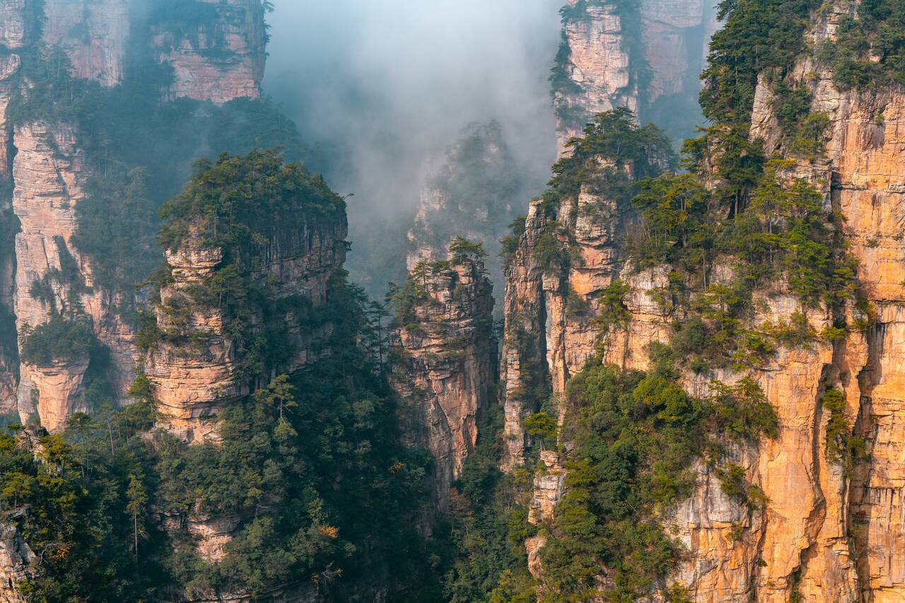 Clouds around mountains in Zhangjiajie