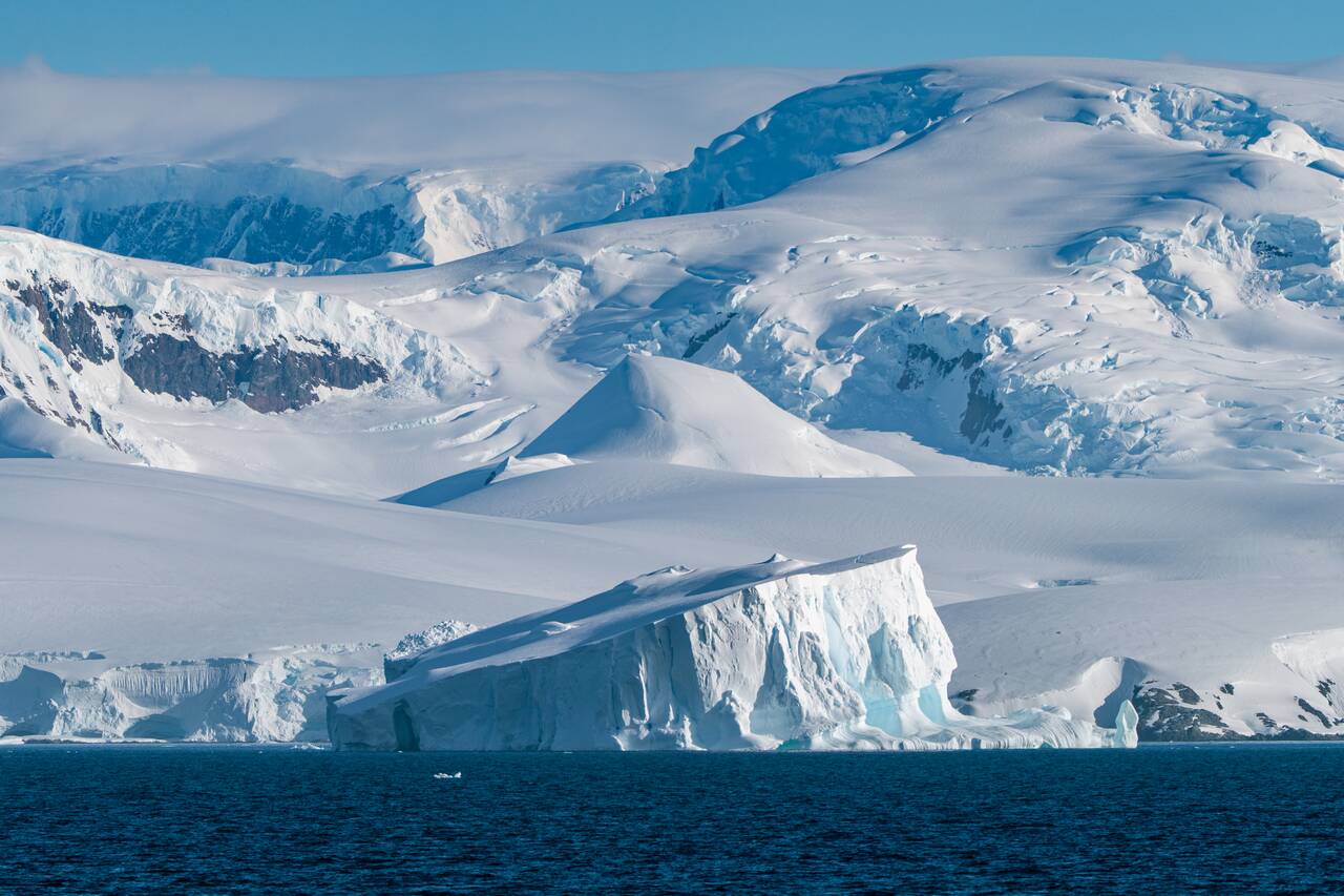An epic iceberg seen on a sunny day at Antarctica