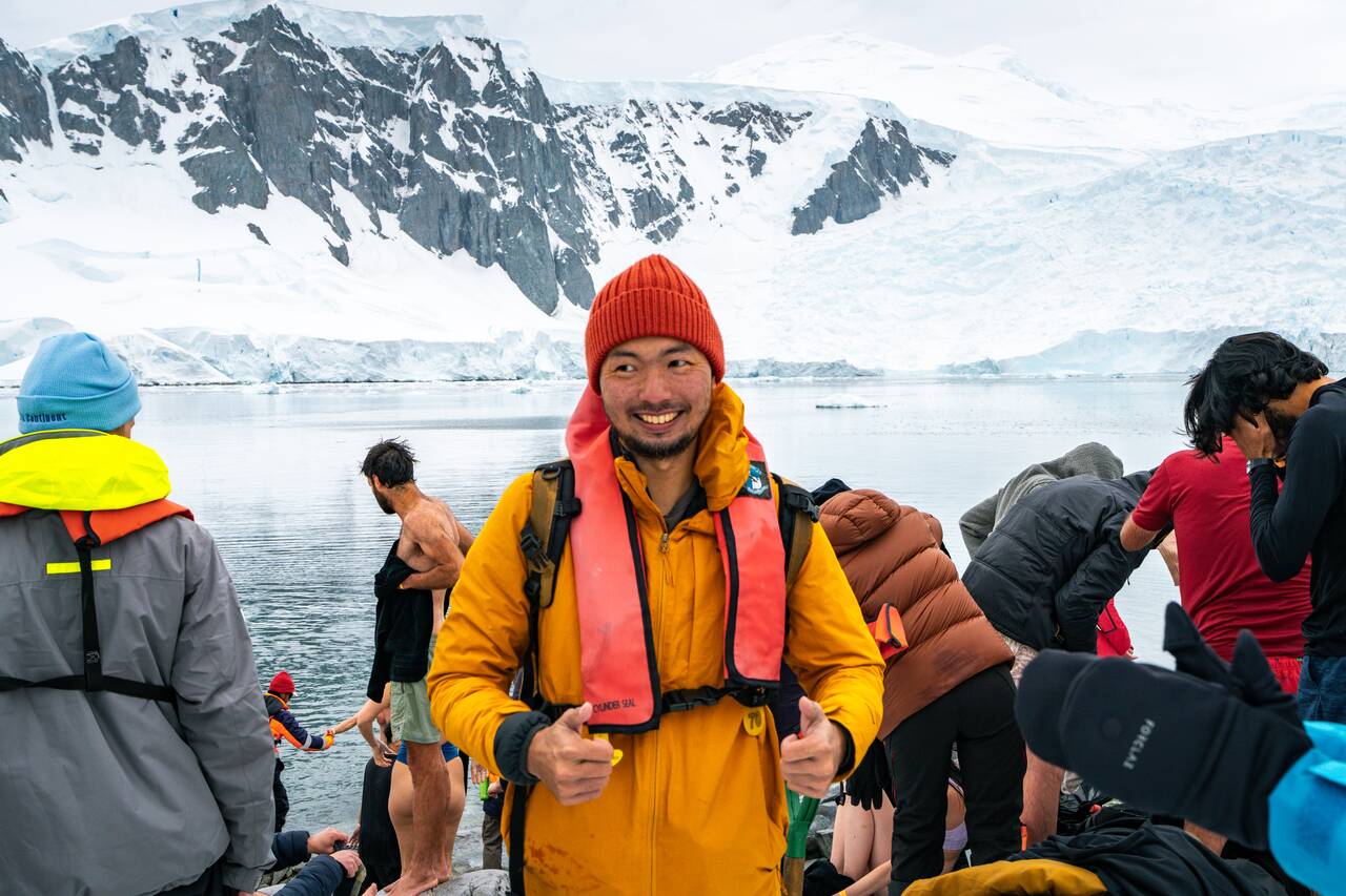 Me giving thumbs up after doing polar plunge in Antarctica