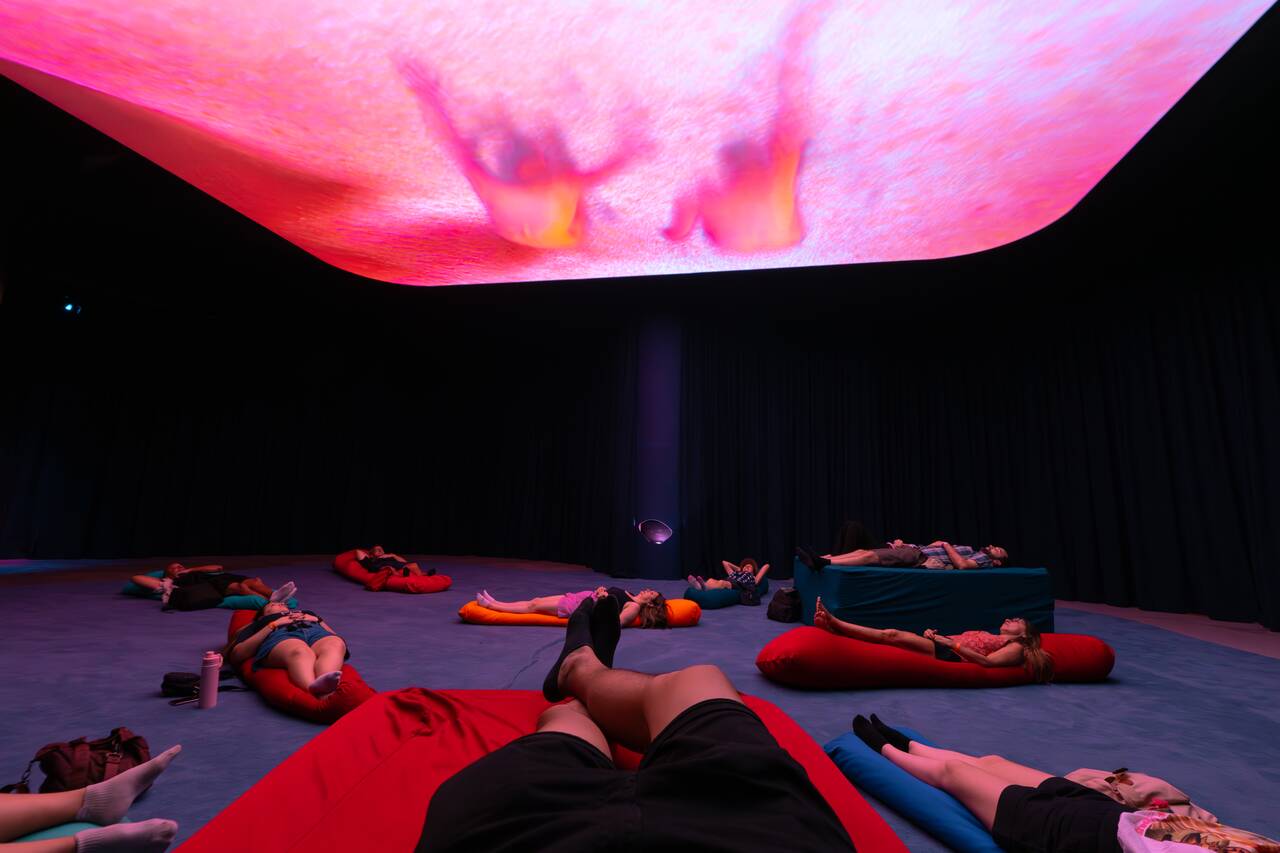 Me lying inside an exhibition about human anatomy