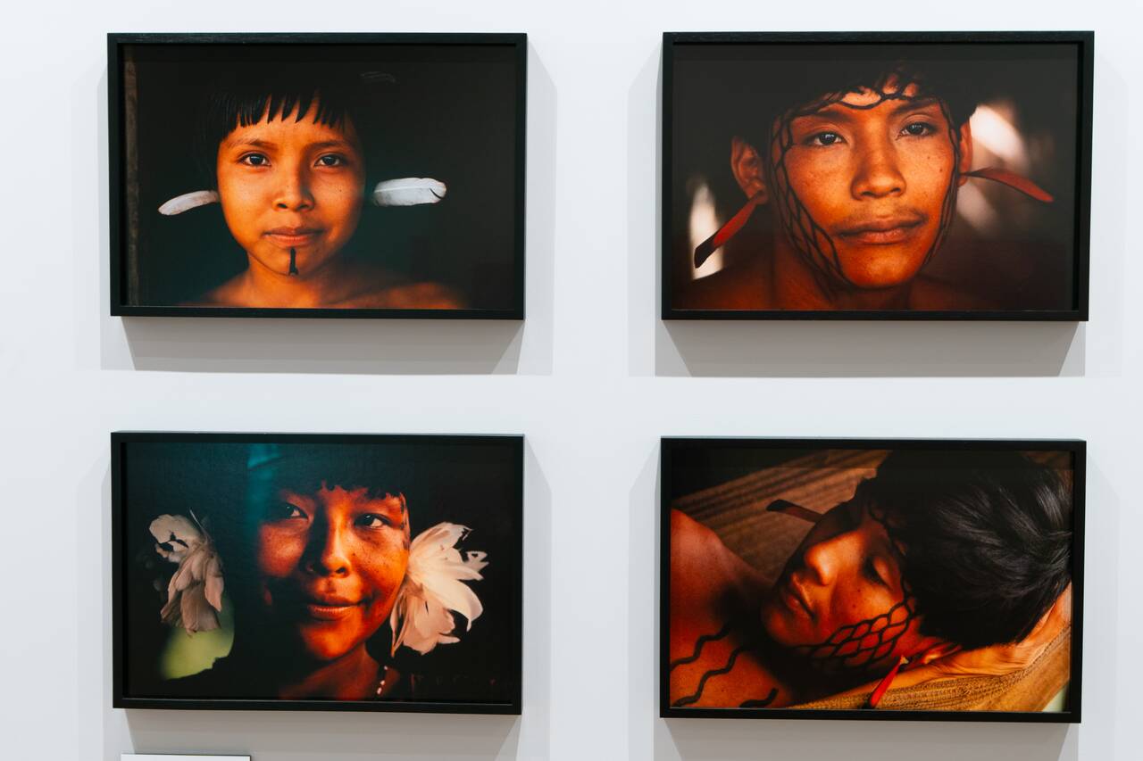 Photos of Indigenous people at Claudia Andujar Gallery