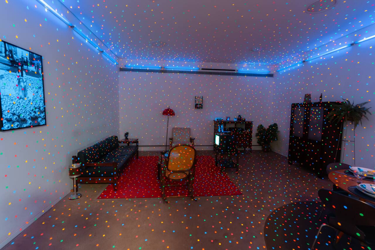 Polka dot room when the light is on at Yayoi Kusama Gallery