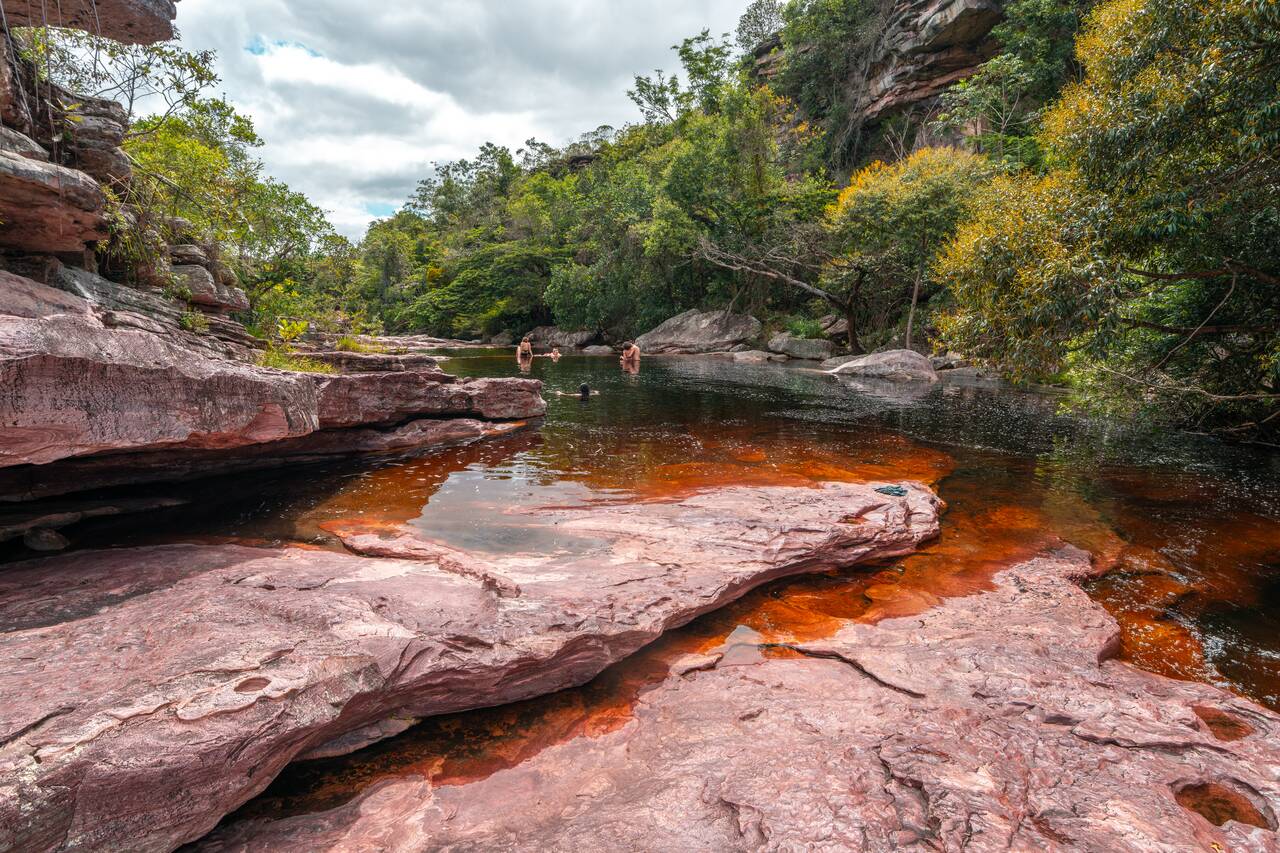People swimming at Poço do Diabo