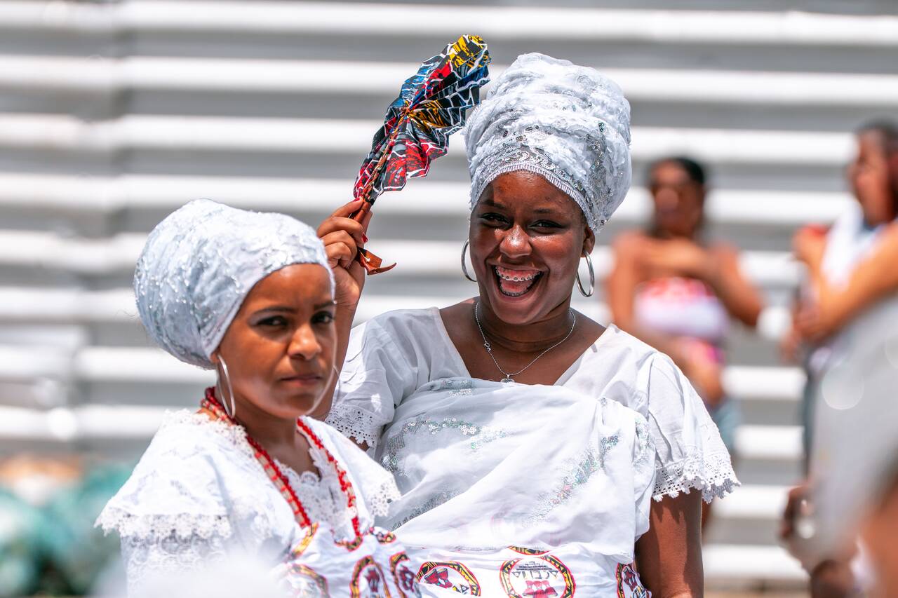 Locals smiling at Bonfim Festival