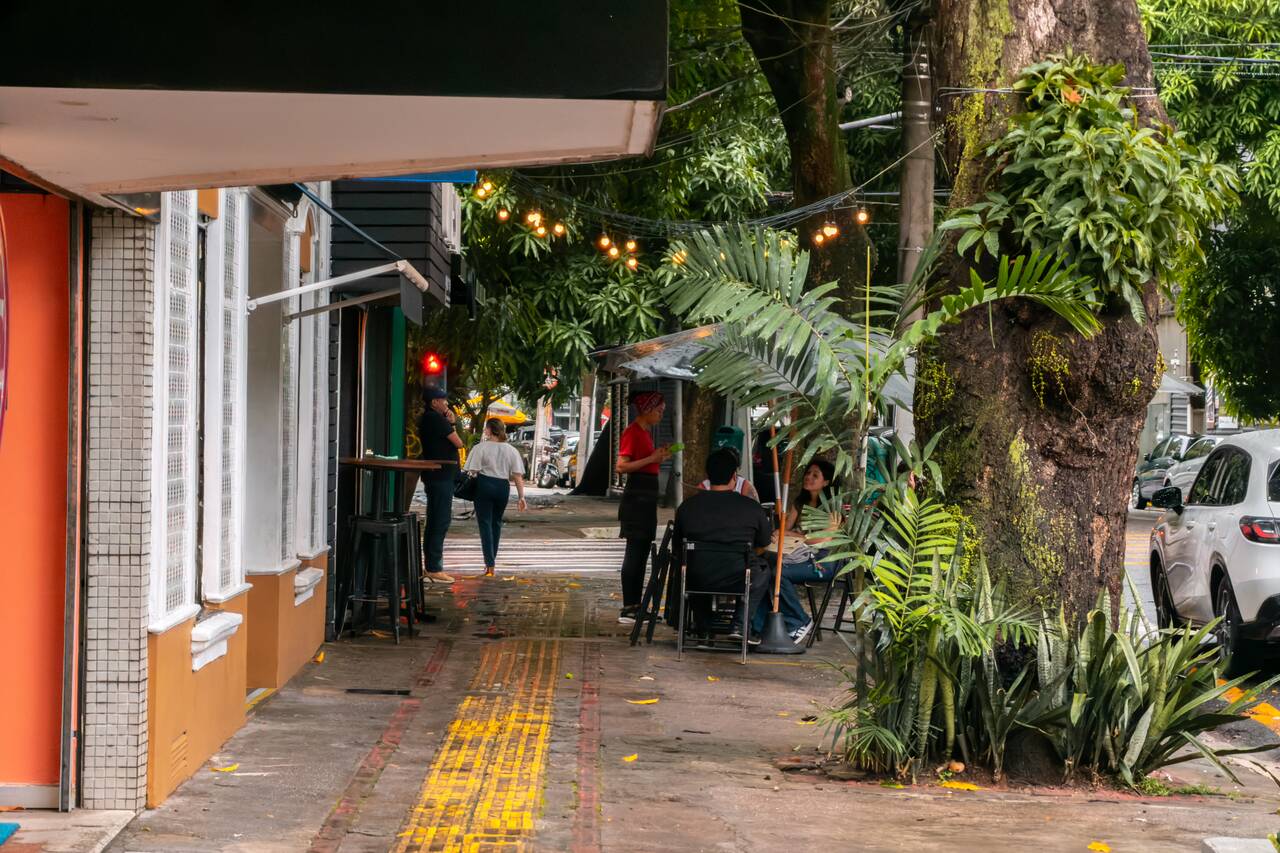 People sitting outside in Belem in the evening