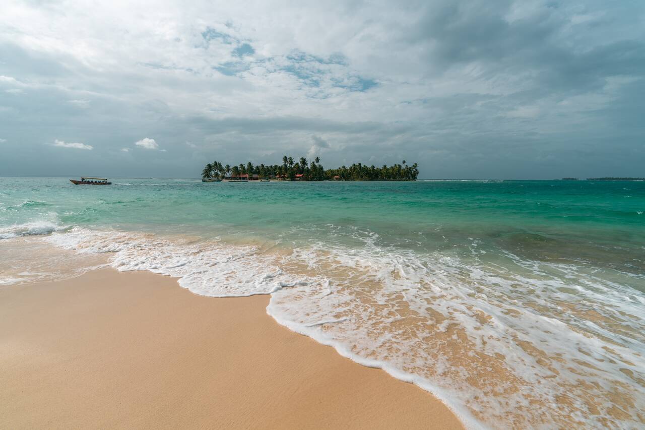 Wave crashing at an island in San Blas Islands on cloudy days