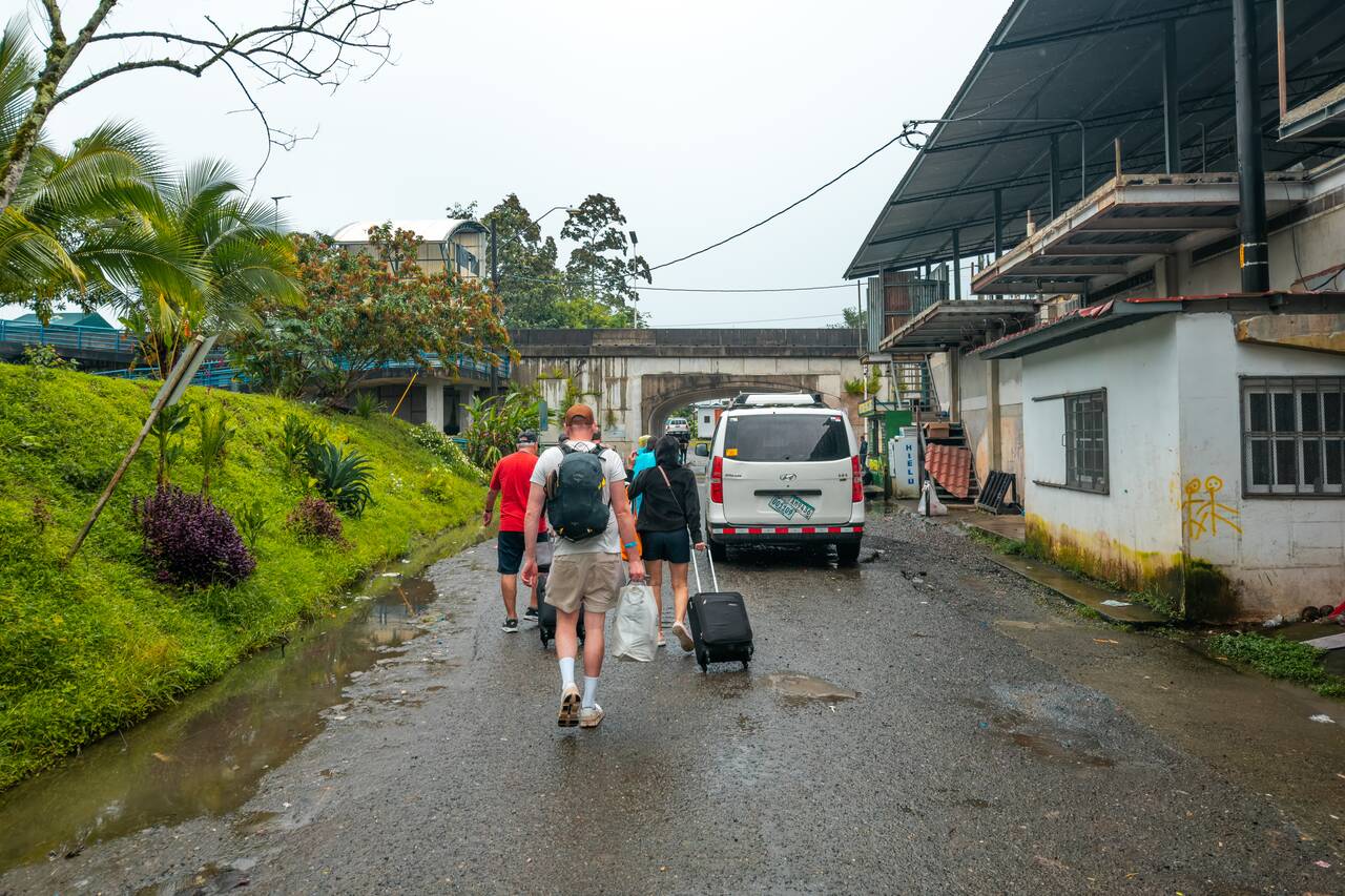 Me and people walking towards the immigration in Panama to cross to to Puerto Viejo in Costa Rica