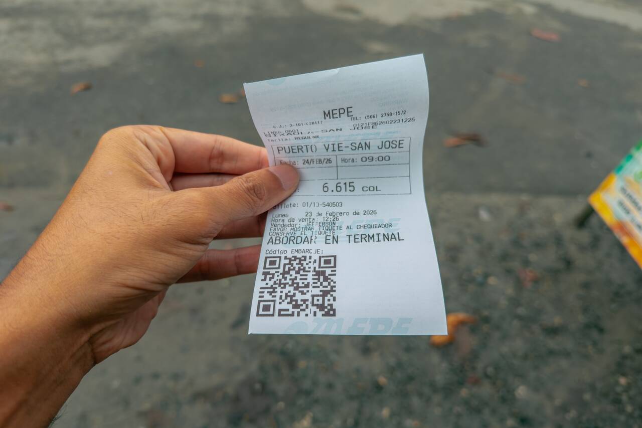 Me holding a ticket from Puerto Viejo to San Jose