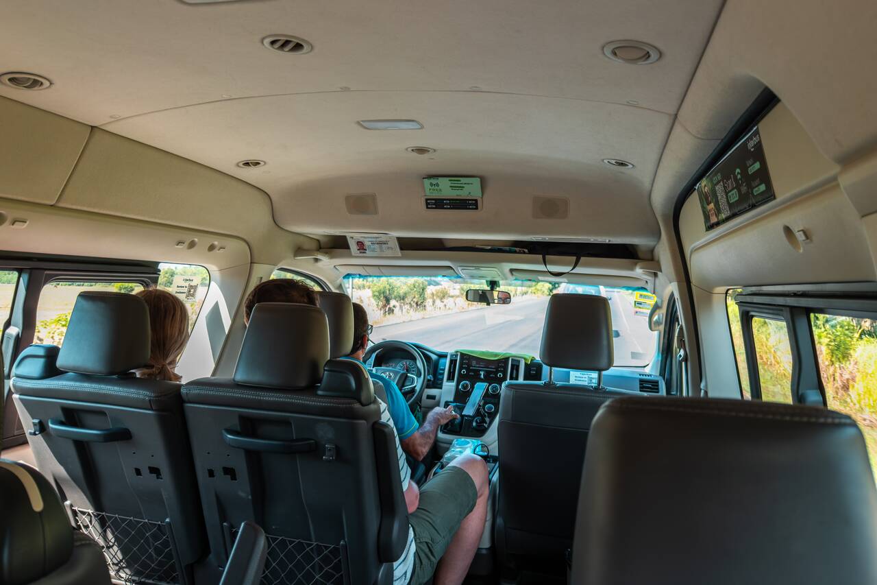Inside a tour bus in La Fortuna