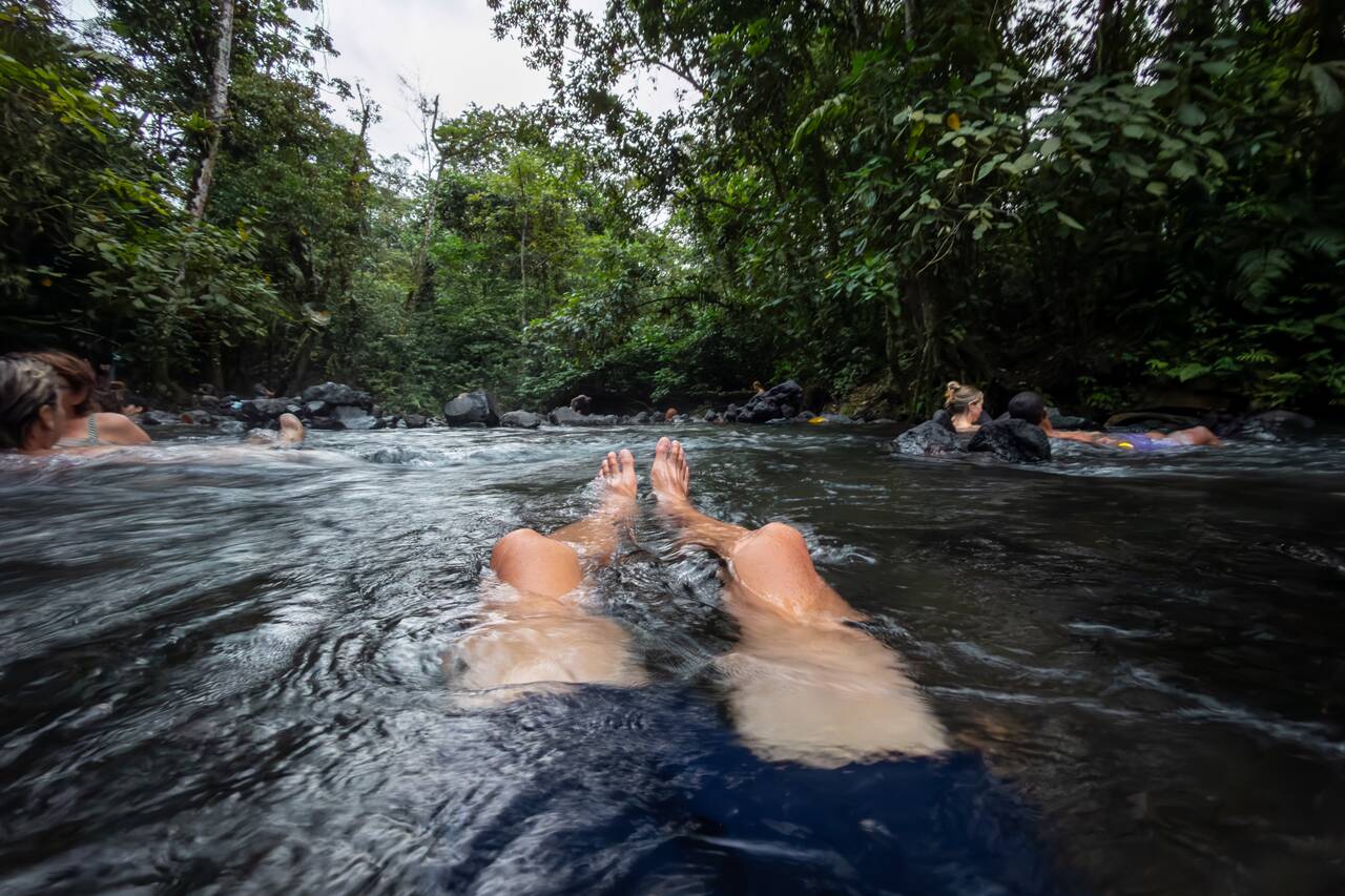 My feet submerged in the water of El Choyin