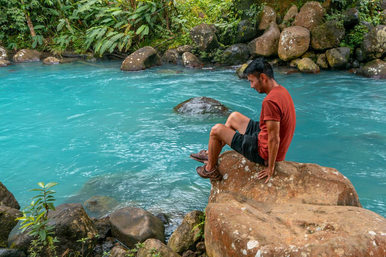 Me sitting on a rock by Celeste River