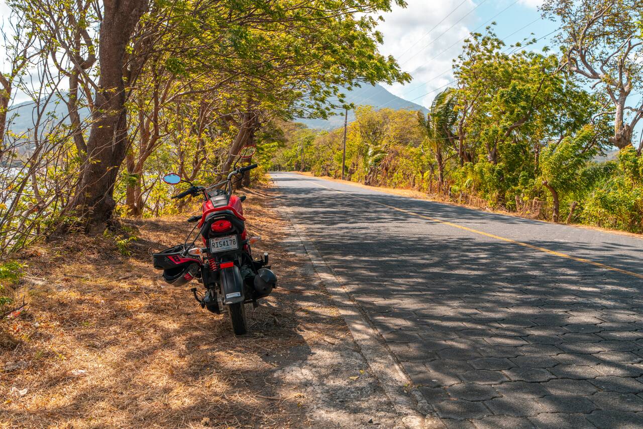 My motorbike parked by Playa San Fernando