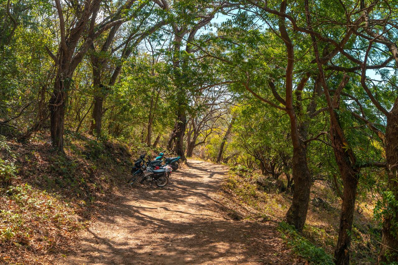Motorbikes parked along the trail to San Ramon trailhead