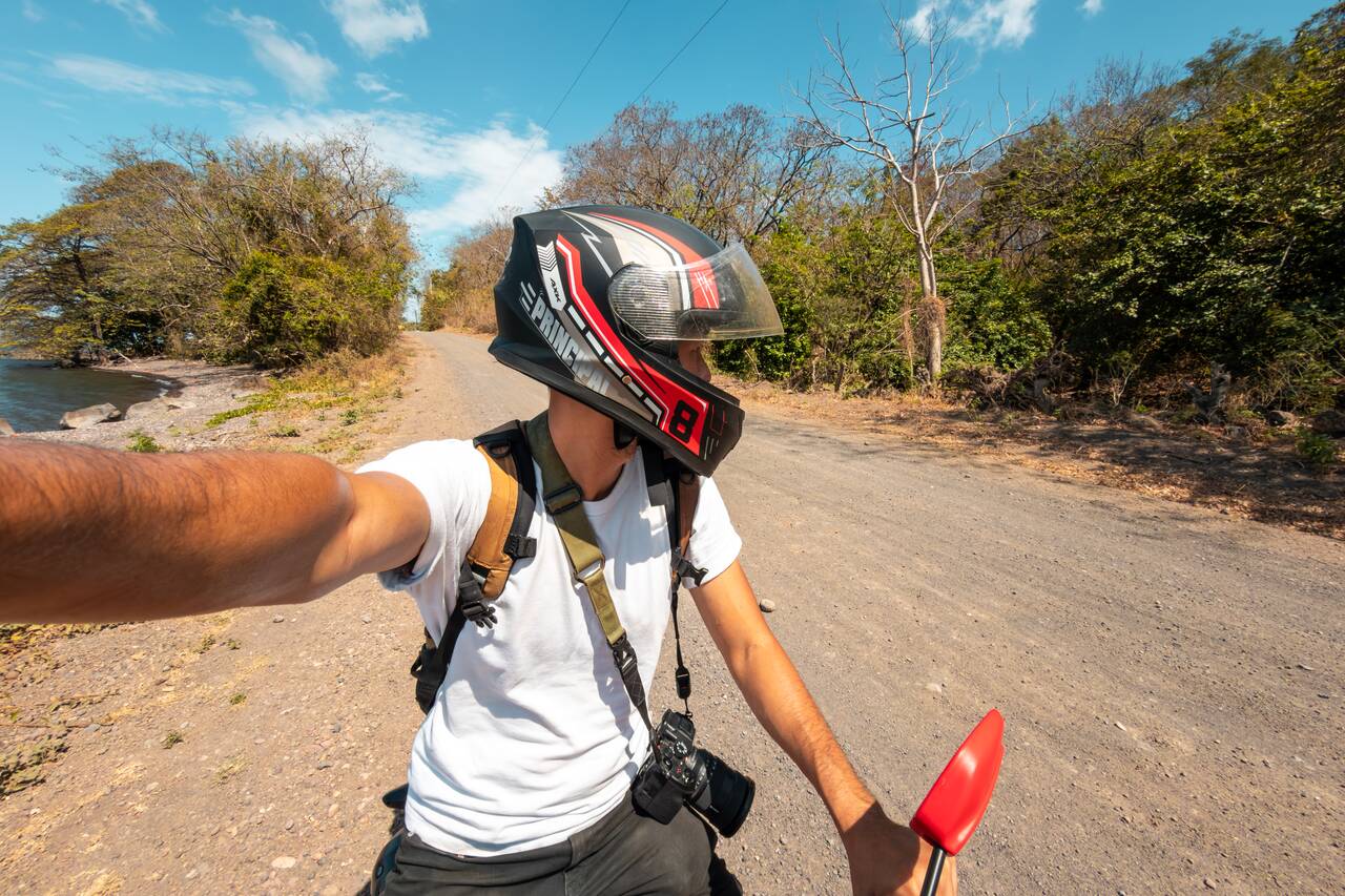 Me wearing a helmet while riding scooter around Ometepe