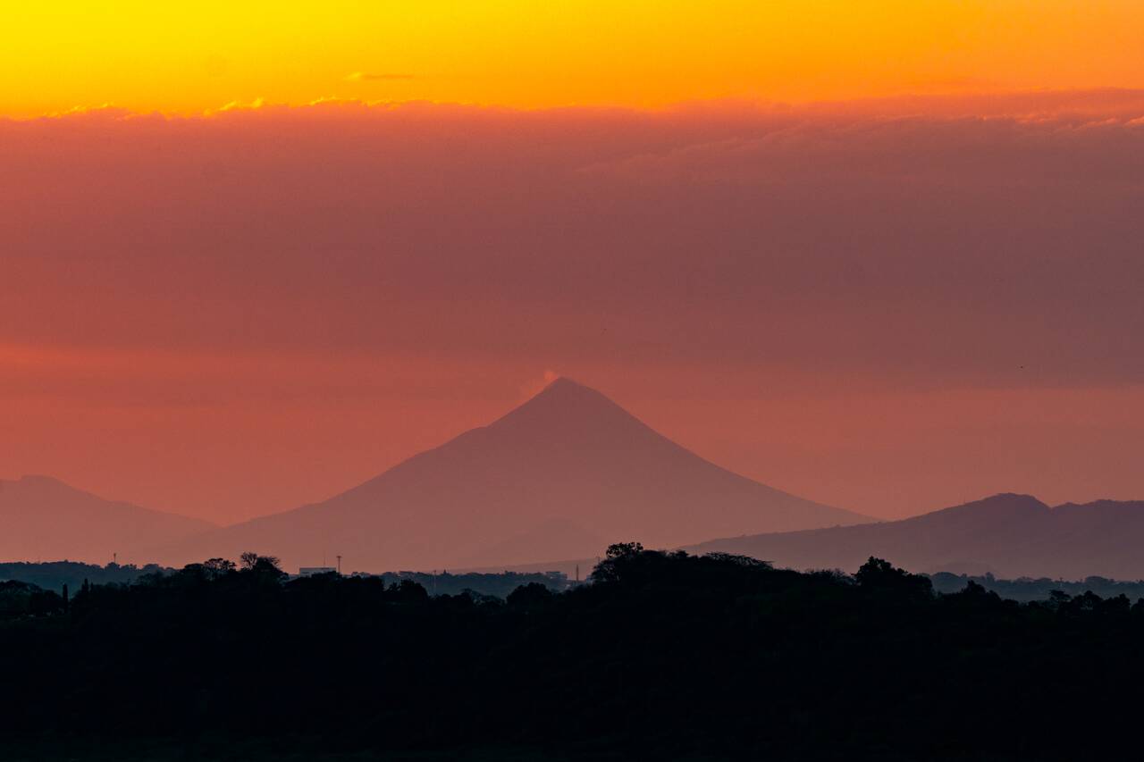 Another volcano seen from Masaya Volcano at sunset