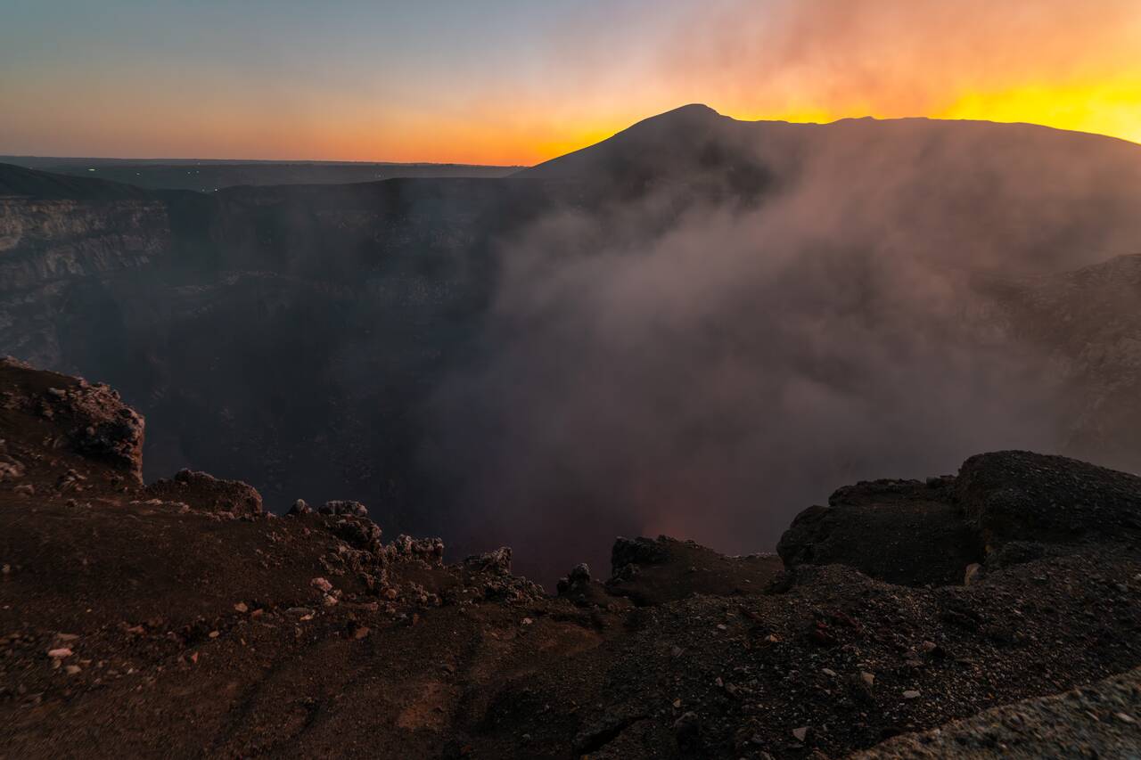 The crater seen with no glow at sunset at Masaya Volcano