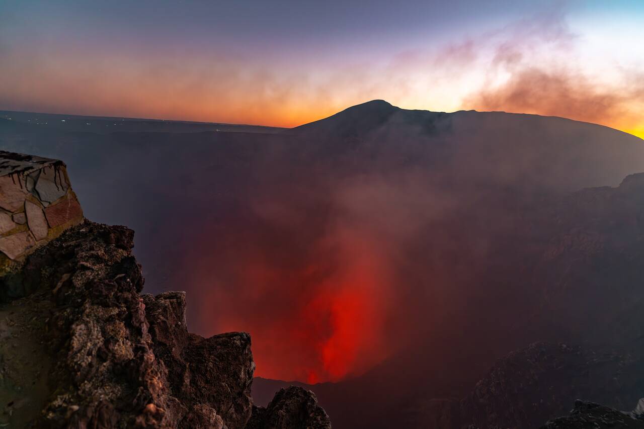 The crater seen with very little glow even after sunset at Masaya Volcano